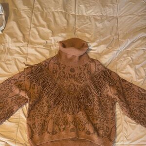 Cozy Brown Turtleneck Sweater with Fringe